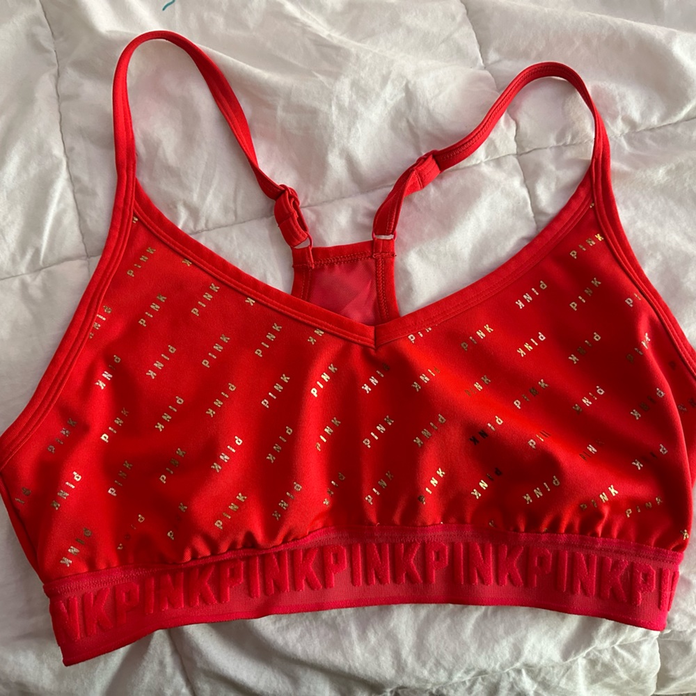 Super cute pink bra. Looks a little orange but is red in person